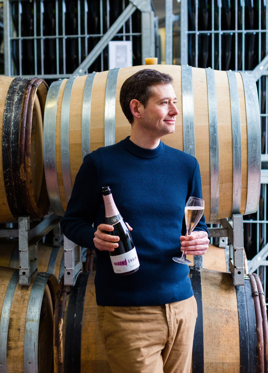 Jacob leadley holding a wine glass