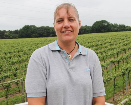 Sue Osgood in vineyard