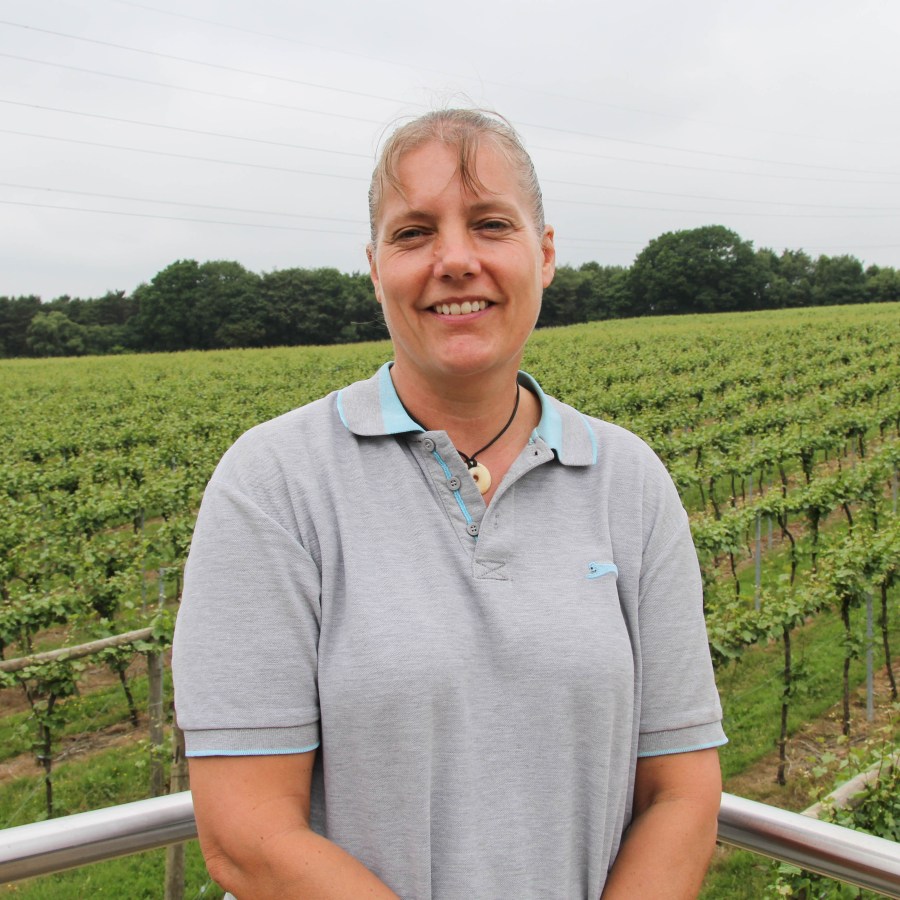 Sue Osgood in vineyard